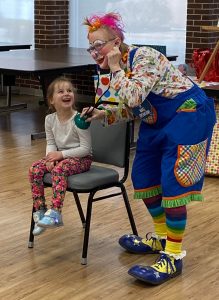 clown and child laughing