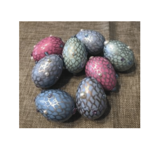 colored eggs with dragon scale designs