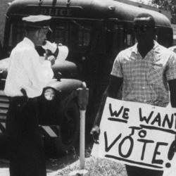 freedom summer protester with sign