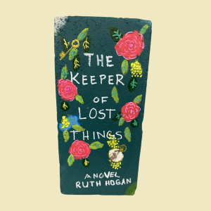 Brick painted like the book The Keeper of Lost Things.